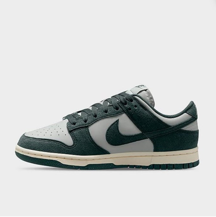 Women's Nike Dunk Low Photon Dust, Vintage Green, Sail & White LE
Next Nature Casual
Shoes